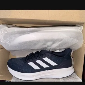 Adidas Black and White Athletic Shoes with Sleek Design