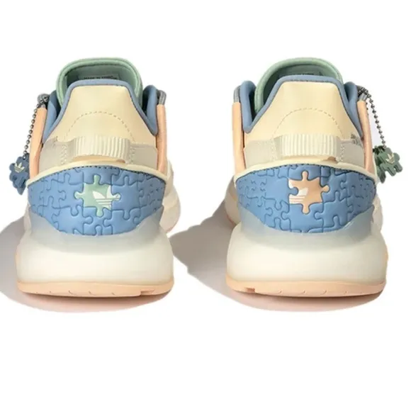adidas originals Unisex ZX 2K Boost Pure Low-Top Running Shoes Beige/Yellow