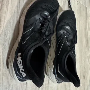 Black and White HOKA Athletic Shoes