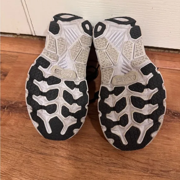 Hoka Black and White Clifton Sneakers