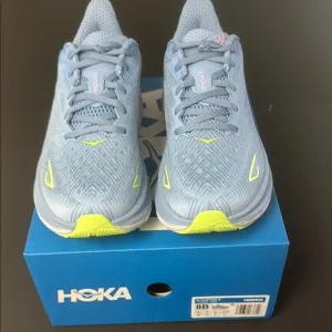 Hoka Light Blue Women’s Athletic Shoes with Neon Highlights