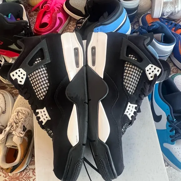 Jordan Black and White Athletic Shoes Air Jordan Retro 4 White Thunder