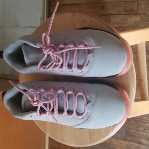 JORDAN&quot; tennis shoes for big boys in grey, black and red.