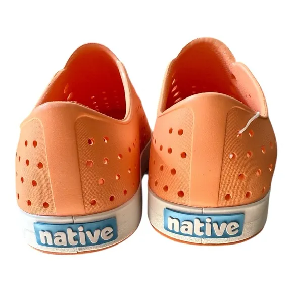Native Orange and White Loafers size Men's 10 woman's 12.