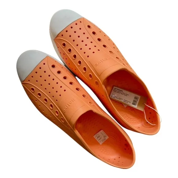 Native Orange and White Loafers size Men's 10 woman's 12.