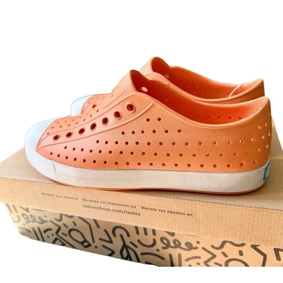 Native Orange and White Loafers size Men's 10 woman's 12.