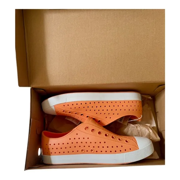 Native Orange and White Loafers size Men's 10 woman's 12.