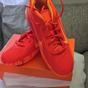 Nike Isofly Kids Orange Athletic Shoes
