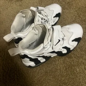 Nike White and Black Athletic Shoes with Sculptural Design