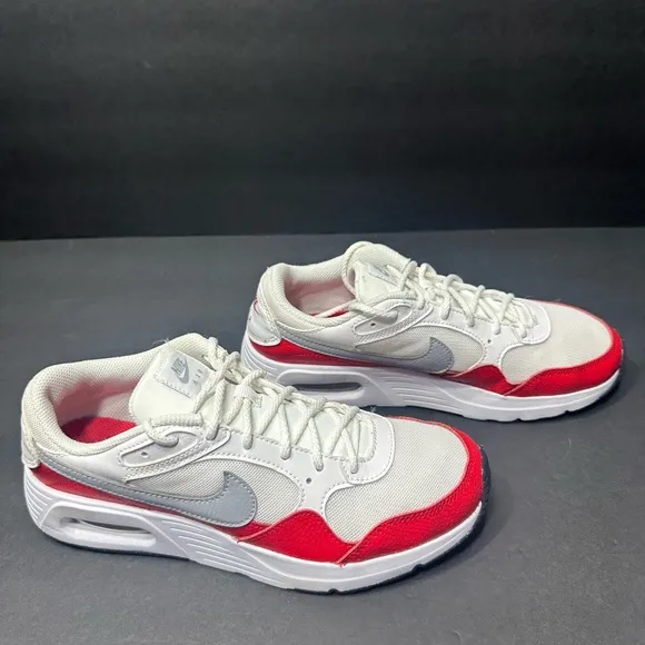 Nike White and Red Sneakers size 6y pre owned Exellent condition.