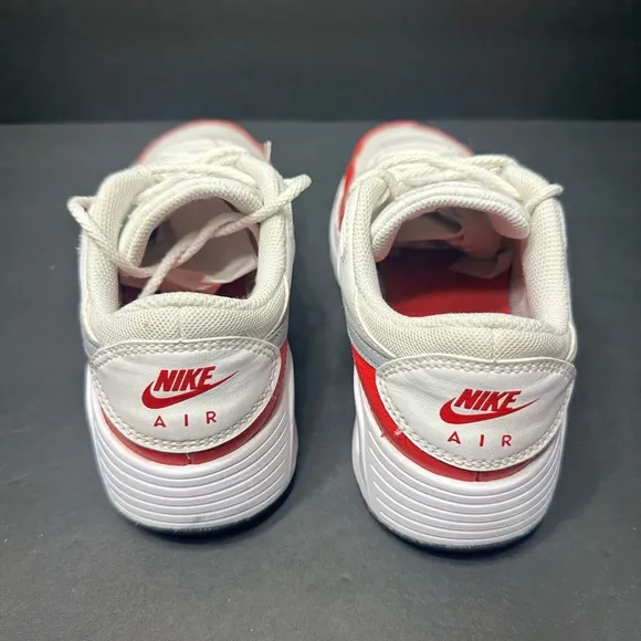 Nike White and Red Sneakers size 6y pre owned Exellent condition.