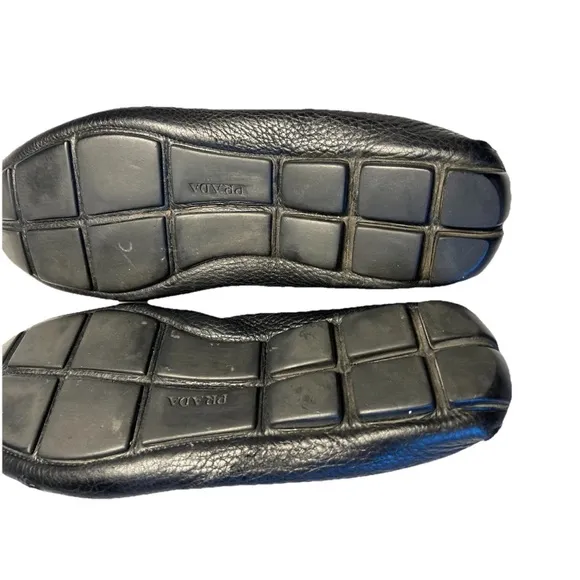 PRADA Black Pebbled Leather Slip-On Loafers with Moccasin Design
