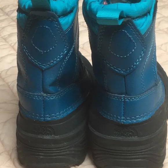 The North Face kids Alpenglow Thermafelt boots with inserts in both boots