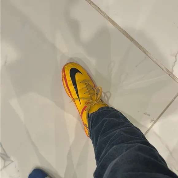 Yellow and Red Nike Athletic Shoes