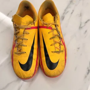 Yellow and Red Nike Athletic Shoes